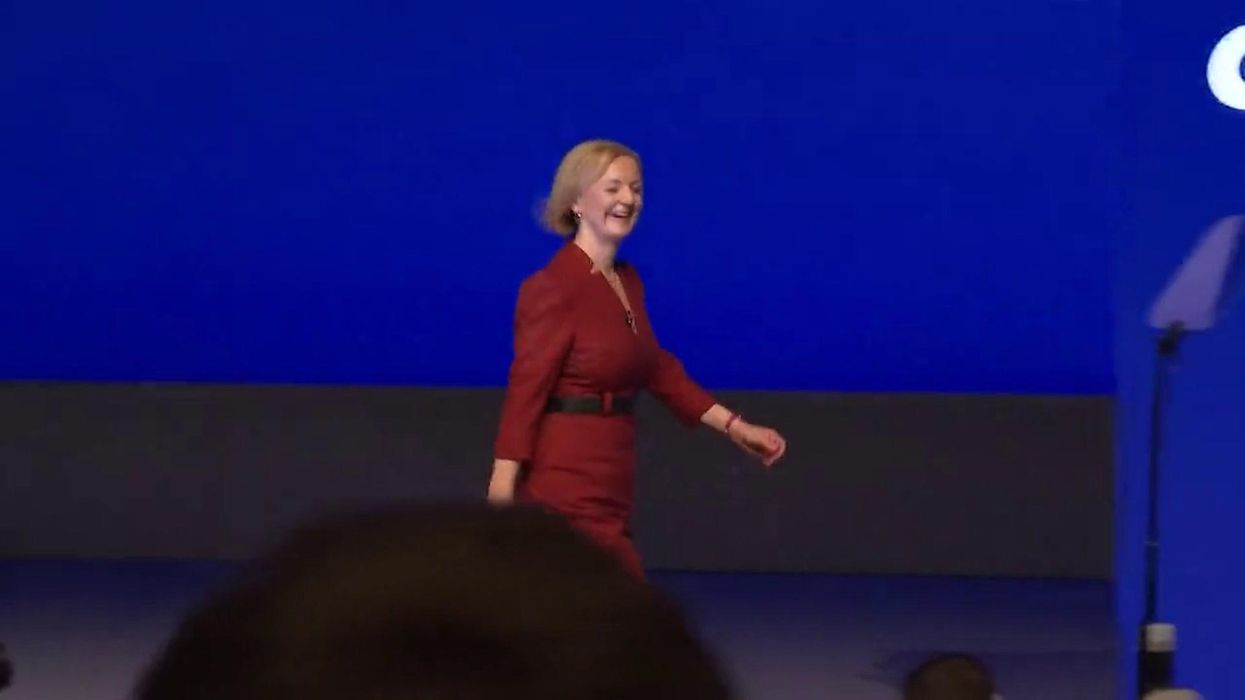 Watch moment Liz Truss struts out to 'Moving On Up' at Tory conference