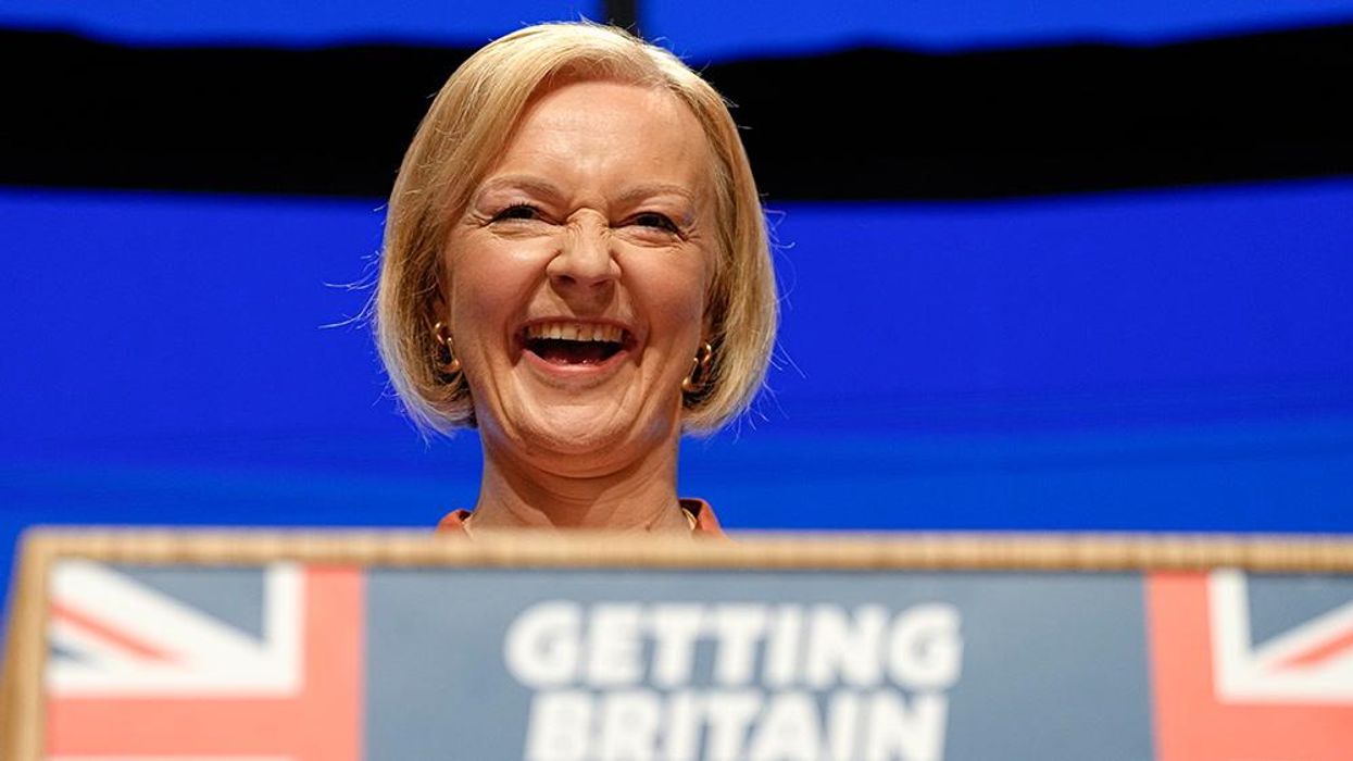 Liz Truss spoke in front of a blue screen and the internet had a field day