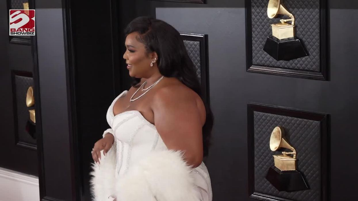 Lizzo responds with new version of Grrrls after facing backlash for ableist slur