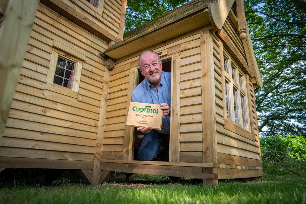 Lockdown category winner Mark Campbell with his castle-inspired shed (Cuprinol Shed of the Year)