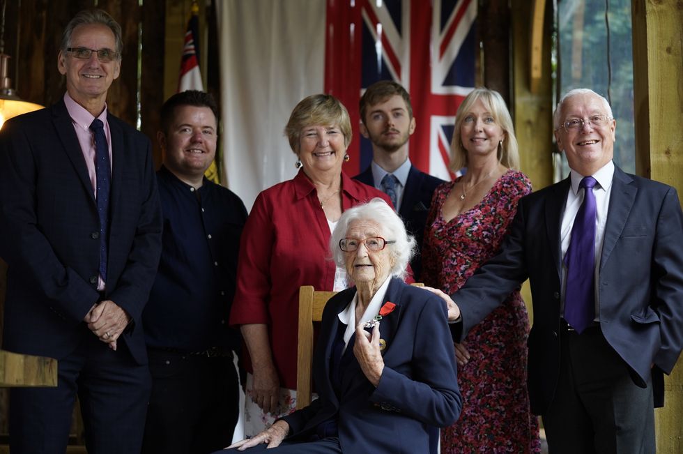 Lorna Cockayne alongside family members after receiving the Legion d\u2019honneur (Andrew Matthews/PA)