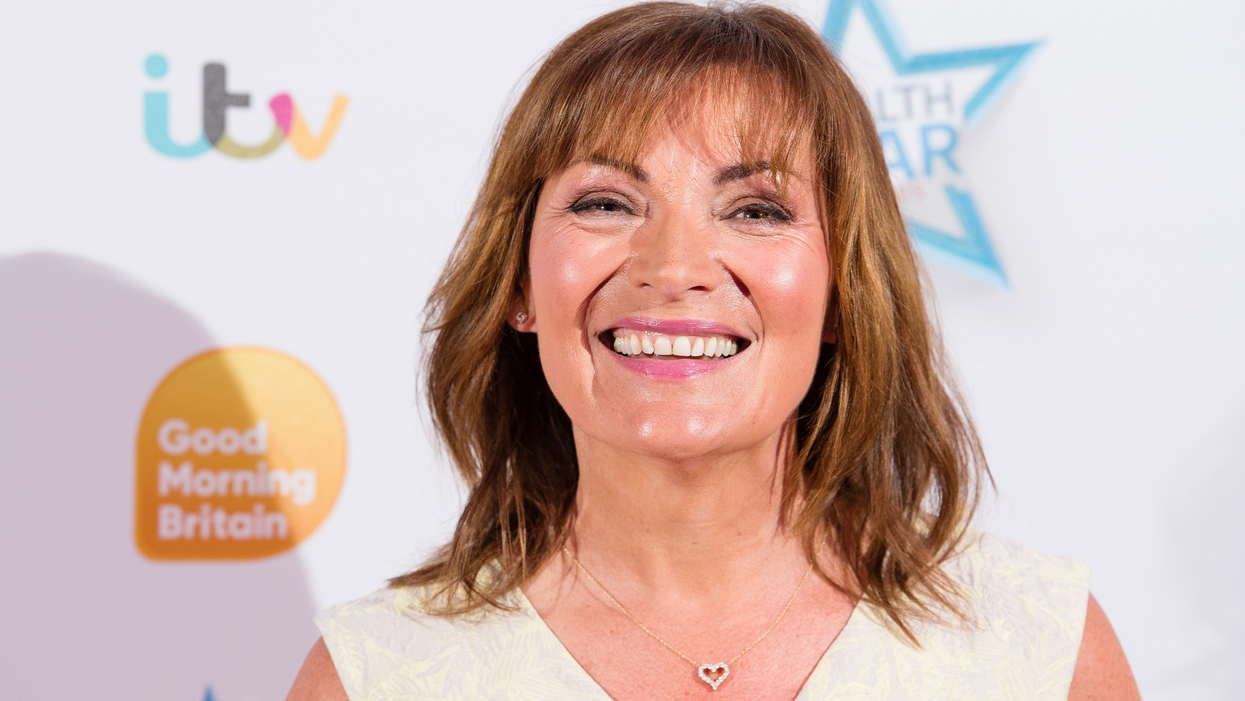 Lorraine Kelly, a white woman with waving brown hair, smiles at the camera.