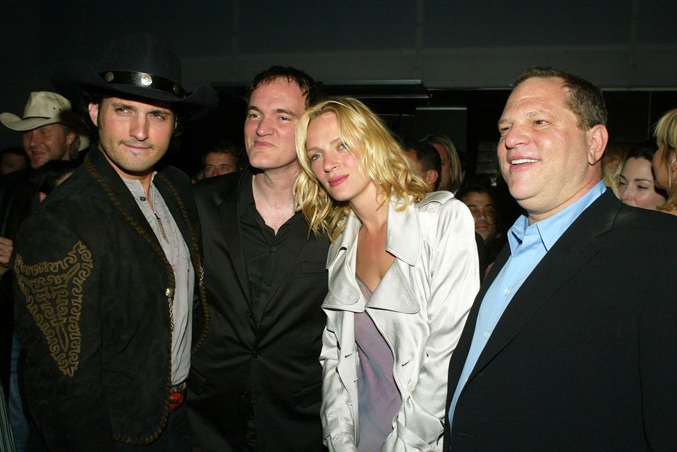 LOS ANGELES - APRIL 8: Director/musician Robert Rodriguez (L), director Quentin Tarantino, actress Uma Thurman and Miramaxs' Harvey Weinstein (R) talk at the after-party for Miramaxs' 'Kill Bill Vol. 2' at The Ivar on April 8, 2004 in Los Angeles, California.