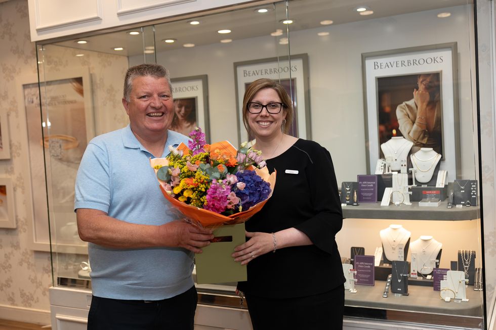 Lottery winner Gary MacDonald with Katie Feeney of Beaverbrooks in Lakeside Shopping Centre