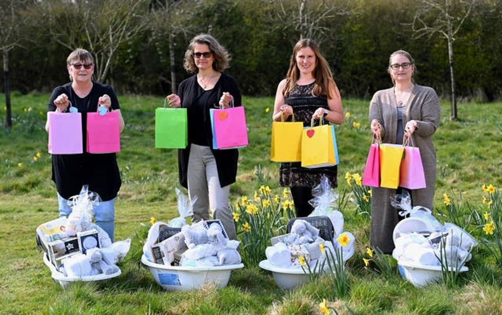 Lottery winners helping out at a charity