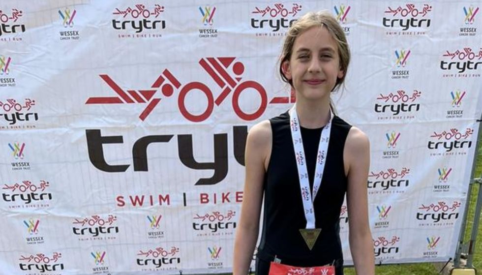 Ten-year-old takes on triathlon in memory of stillborn brother