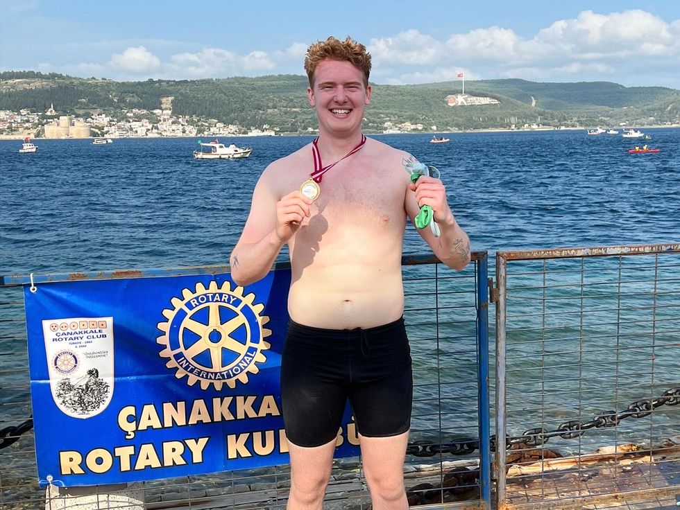 Athlete completes world’s oldest swimming challenge in memory of his grandfather
