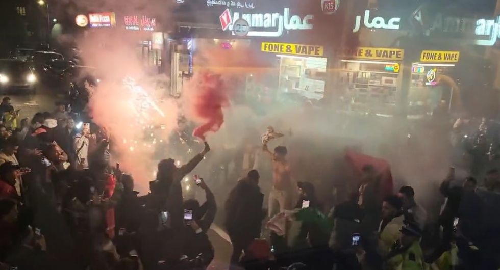 Morocco fans celebrate World Cup win with dancing and singing on London streets