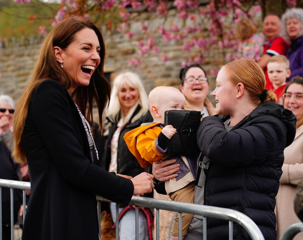‘Priceless’ moment as baby grabs Kate’s handbag during Aberfan visit
