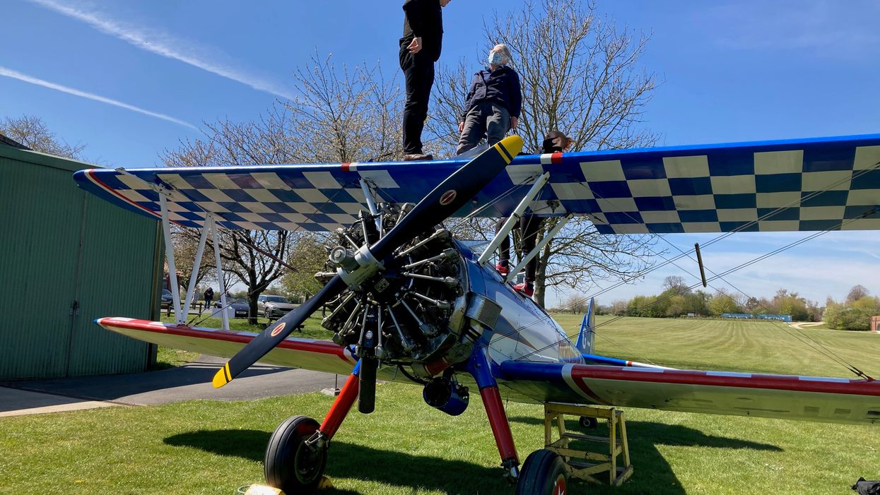 <p>Lyn Mitchell, 90, gets ready to take part in her charity wing-walk challenge (Macmillan Cancer Support/PA).</p>