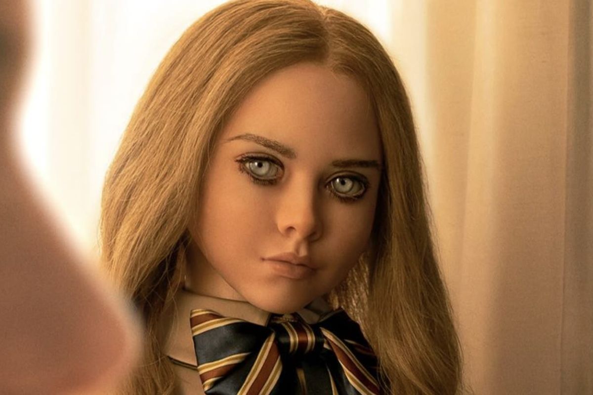 M3gan doll looks into camera in still from film