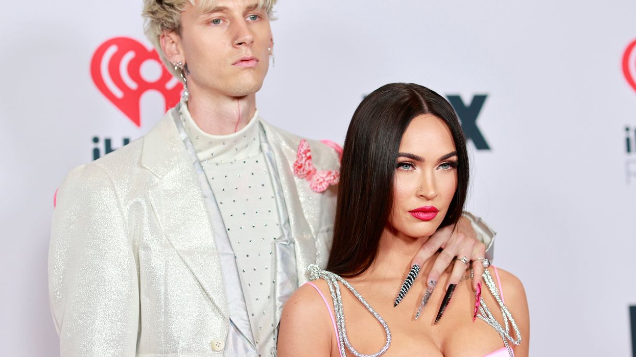 <p>Machine Gun Kelly and Megan Fox attend the 2021 iHeartRadio Music Awards on 27 May 2021 in Los Angeles, California</p>