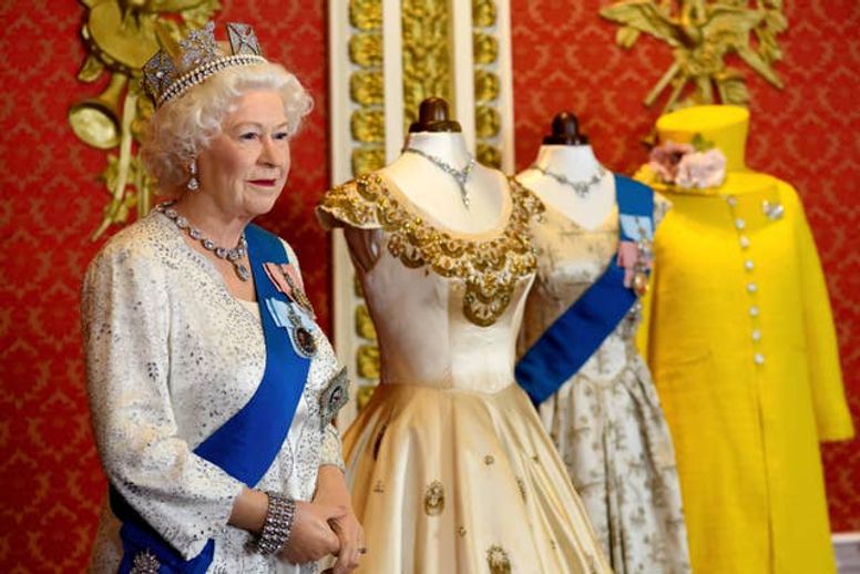 Madame Tussauds to share its replica dress collection of Queen's outfits |  indy100