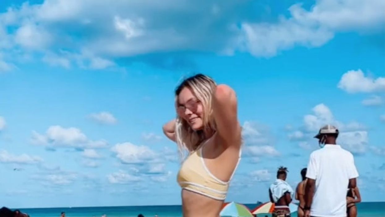 <p>Madi Marotta thought it was just a classic beach snap... until she looked closer</p>