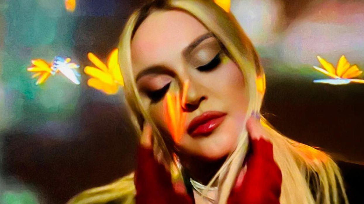 Madonna suffers wardrobe malfunction after needing help to get her boots off