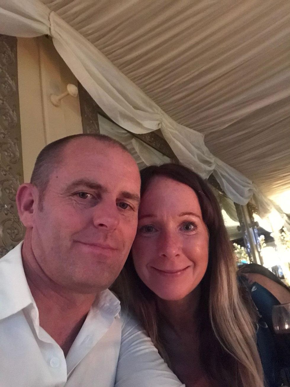 Man and woman posing together