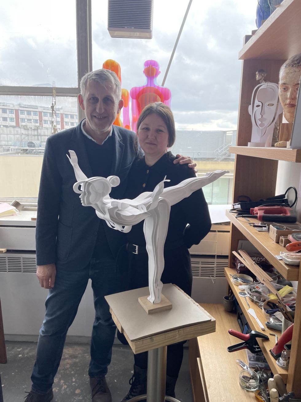 Man and woman posing together