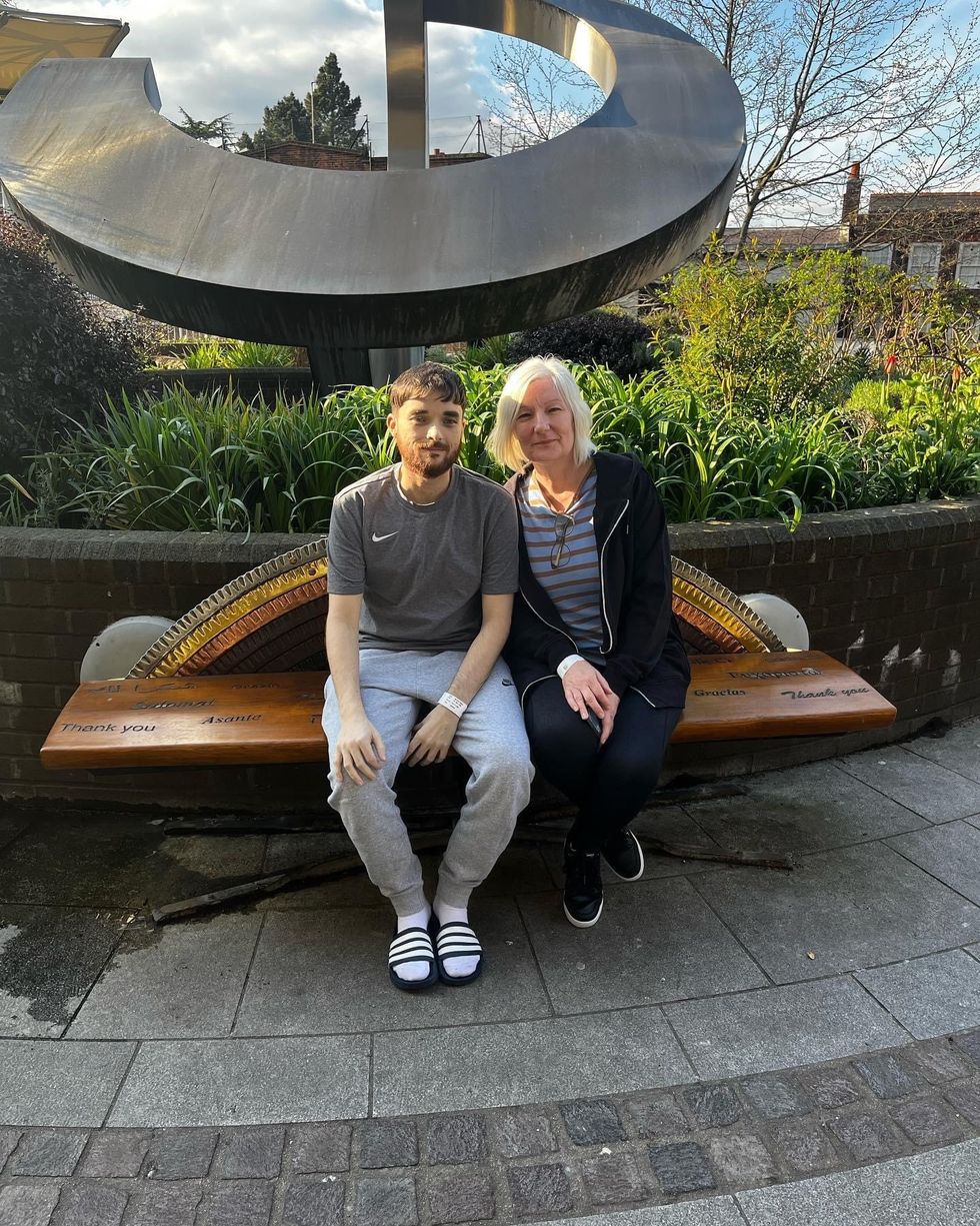 Man and woman sitting next to each other