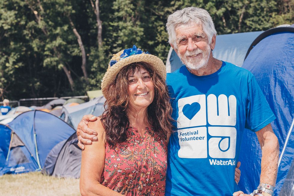 Man and woman standing together and smiling