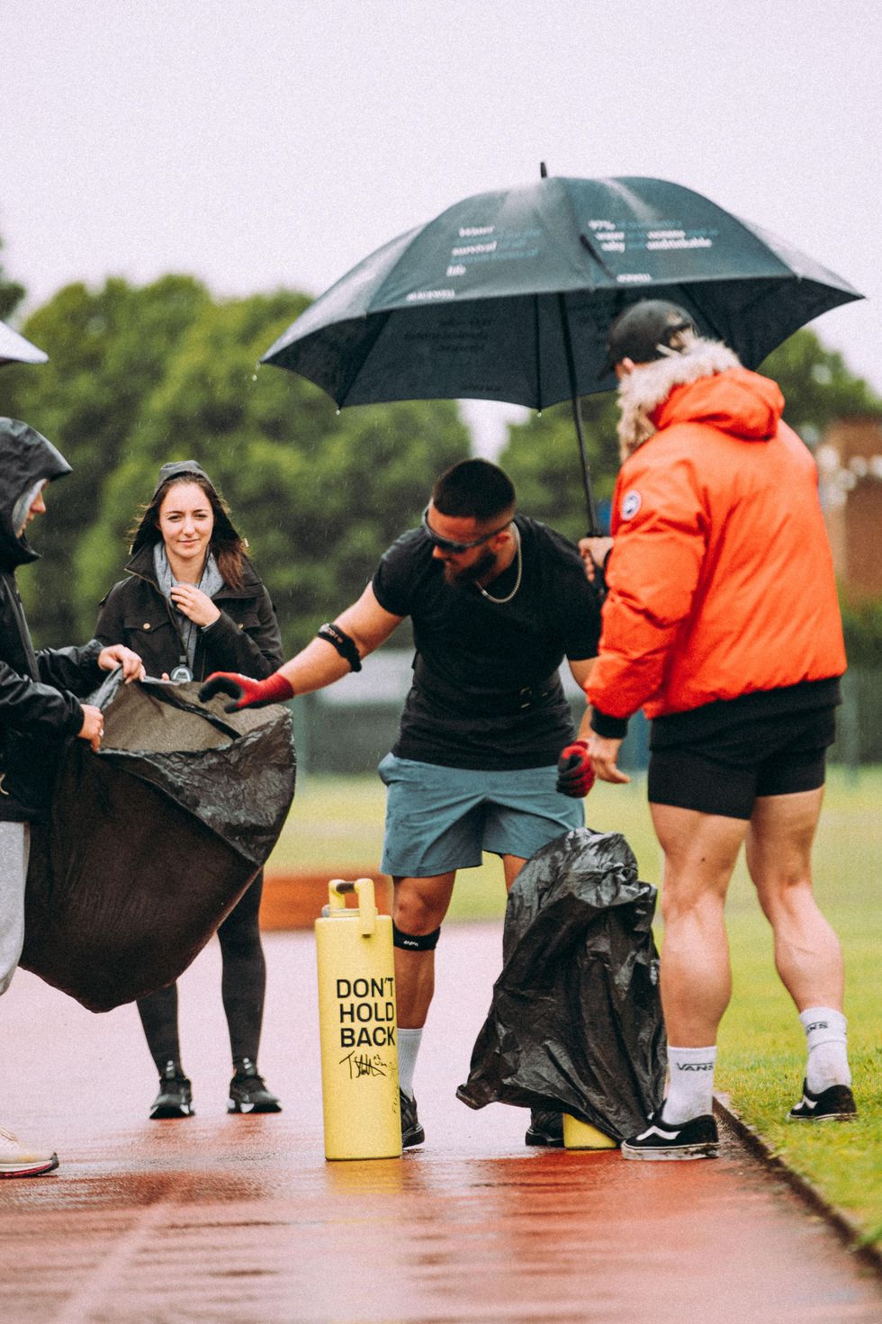 Man bending down to grab something