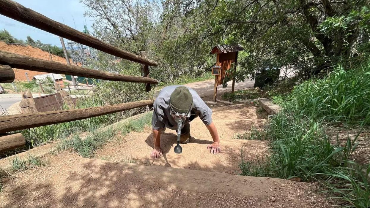 Man breaks record for pushing peanut up a mountain with his nose