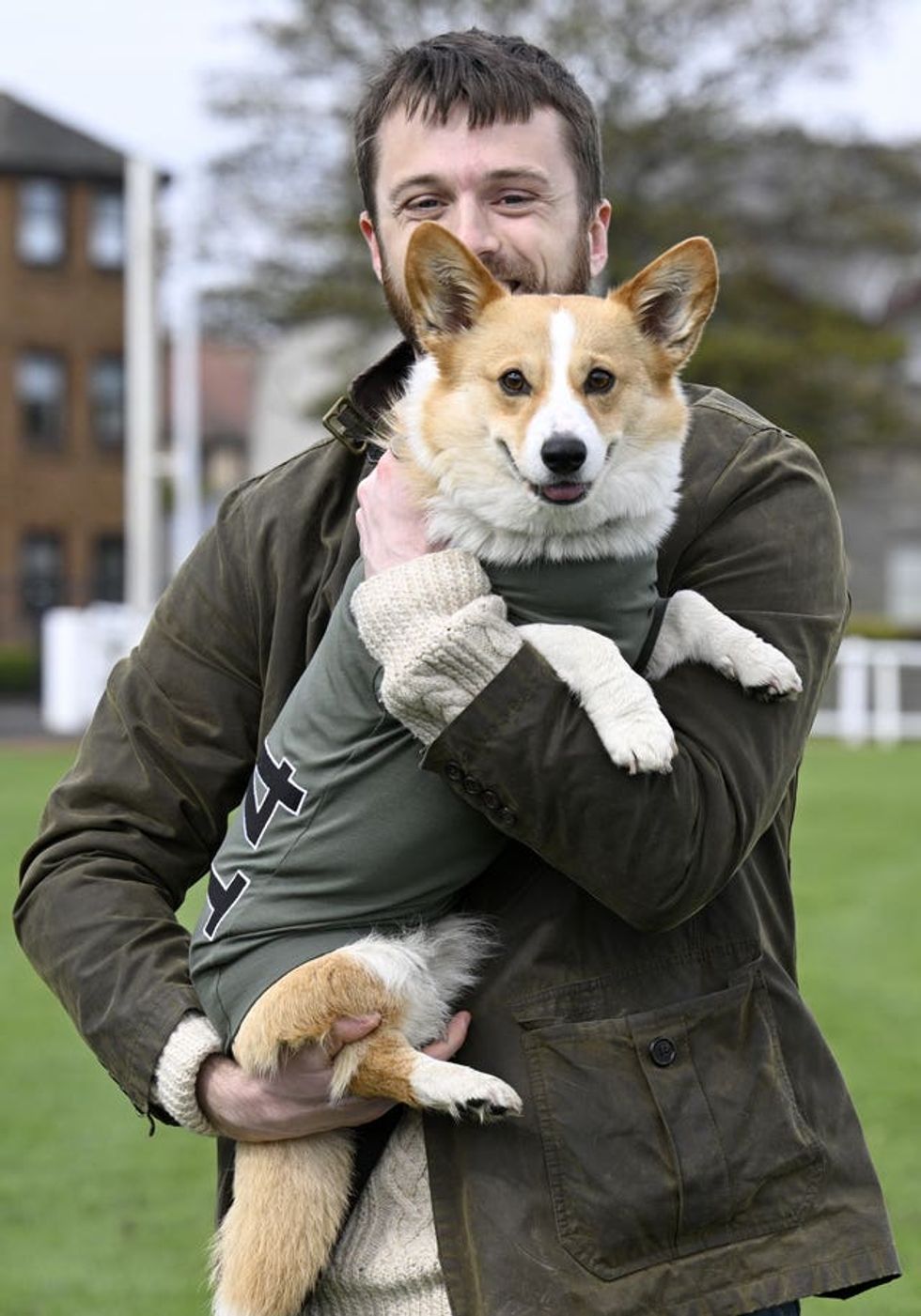 Man holding dog