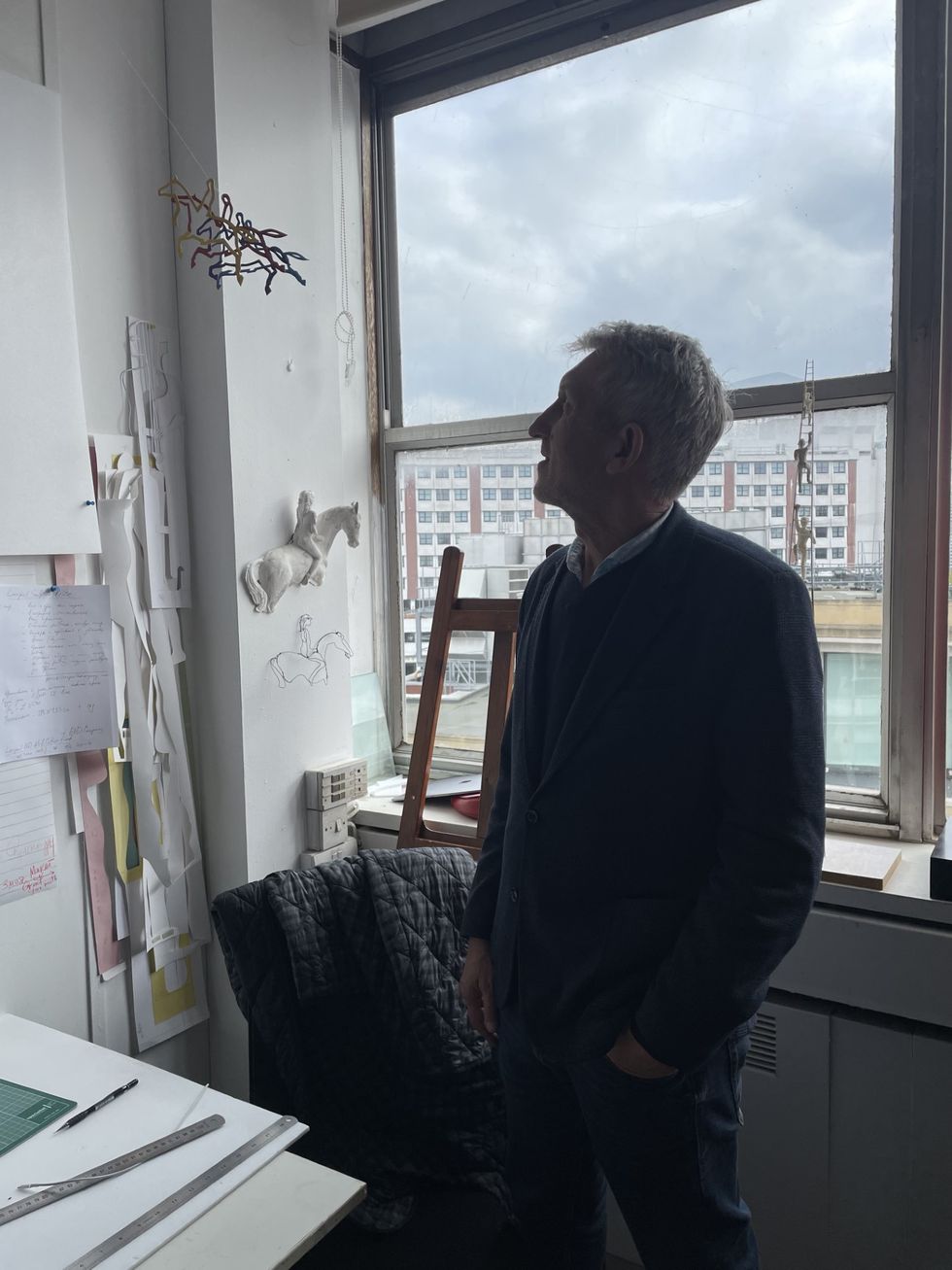 Man looking at something on the ceiling