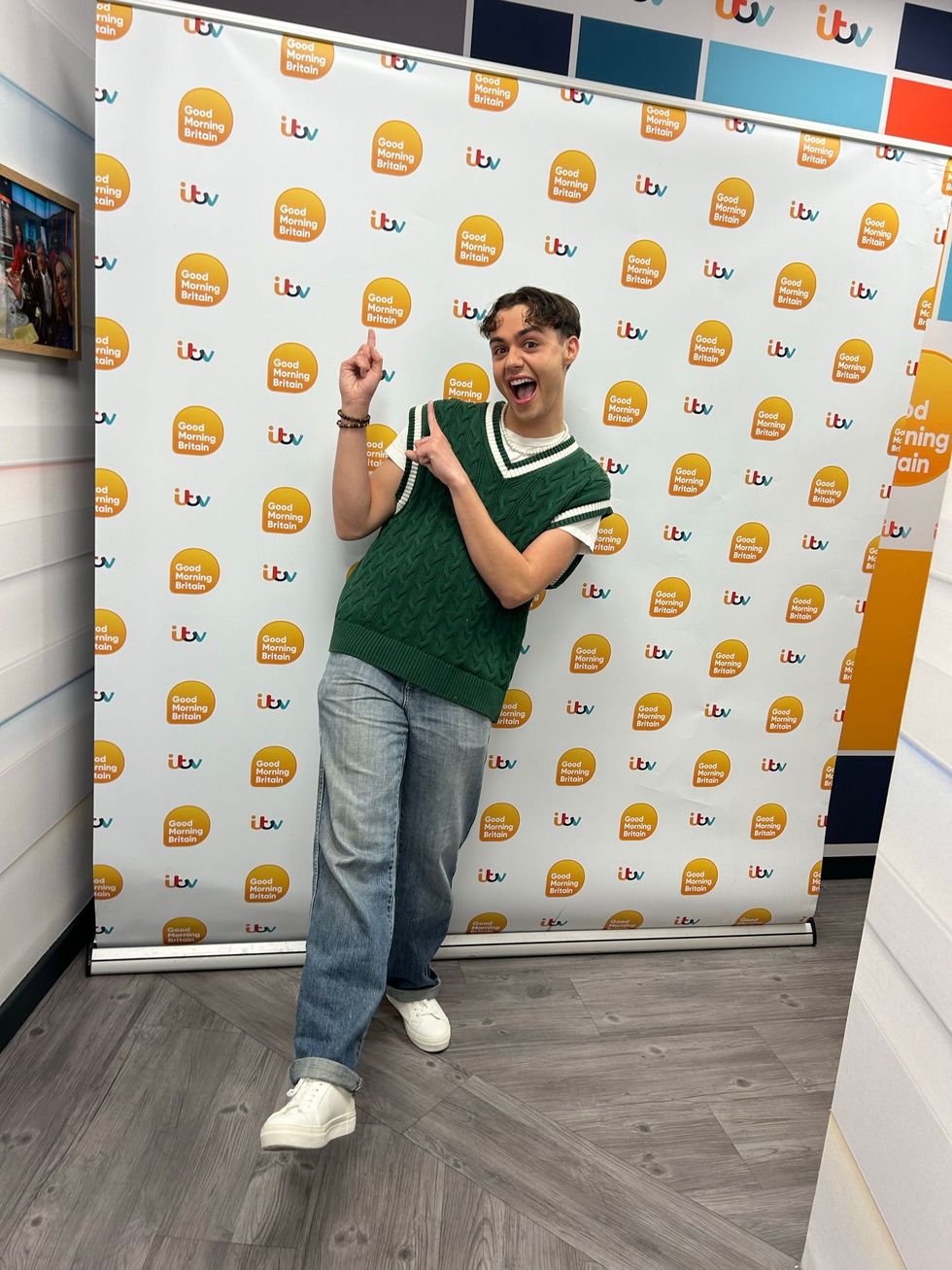 Man pointing at background