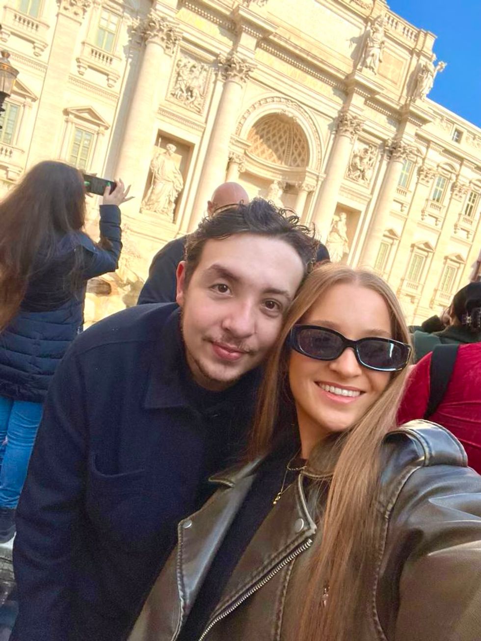 Man posing with woman