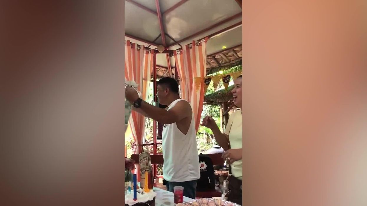 Man receives savage money cake full of utility bills for his birthday