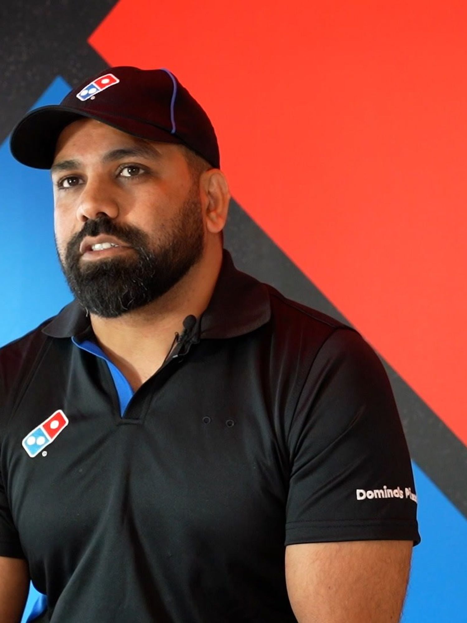 Man who learnt to speak English from Domino's pizza menu opens store