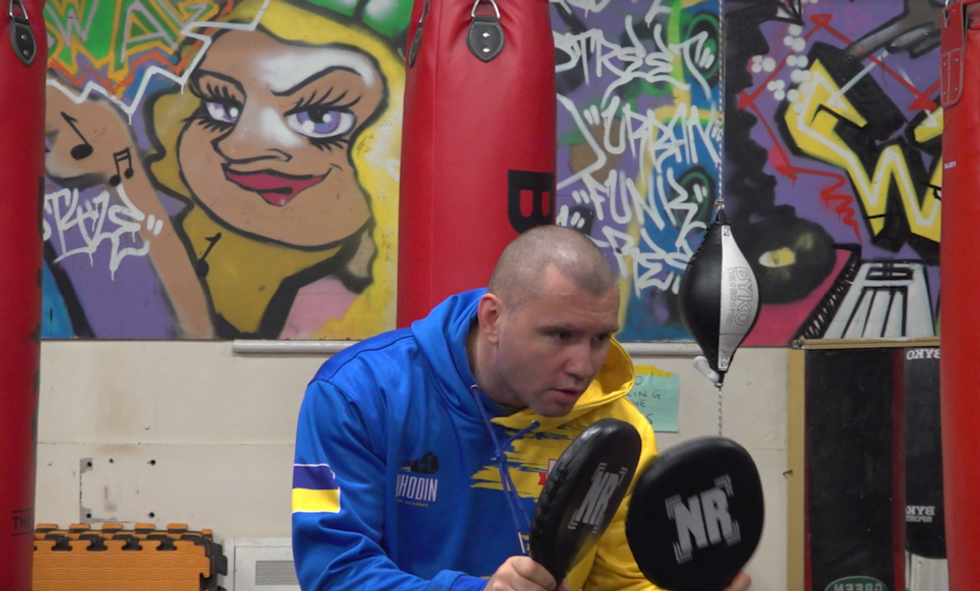 Man with boxing pads