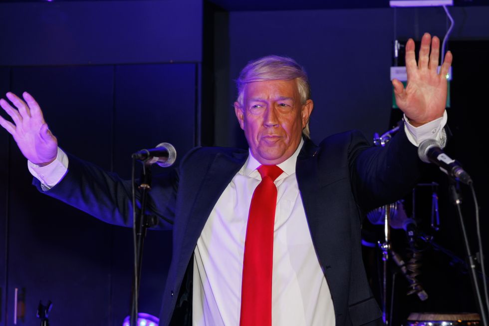 Man with hands in air