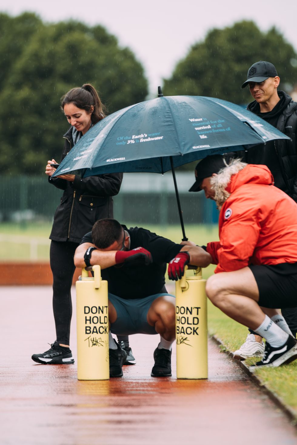 Man with his head in his hands and bending down