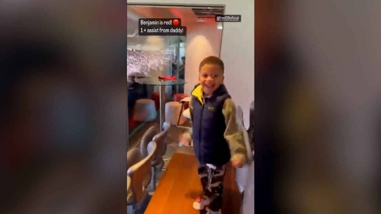 Man United fans sweetly celebrate Fred’s assist with his young son at game