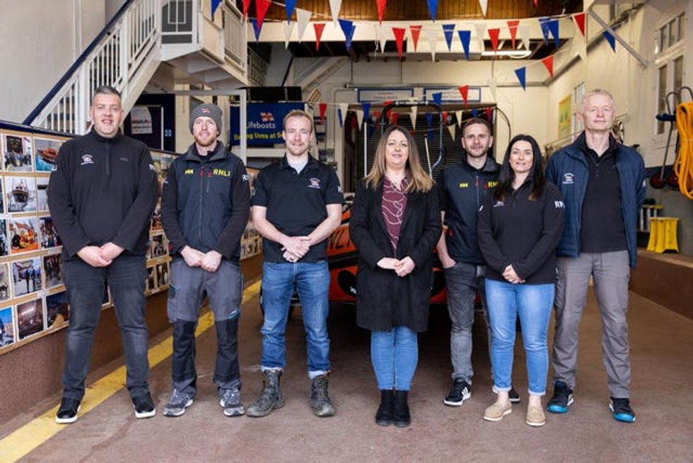 Mandy Galloway (centre) with some of the RNLI volunteers who saved her life