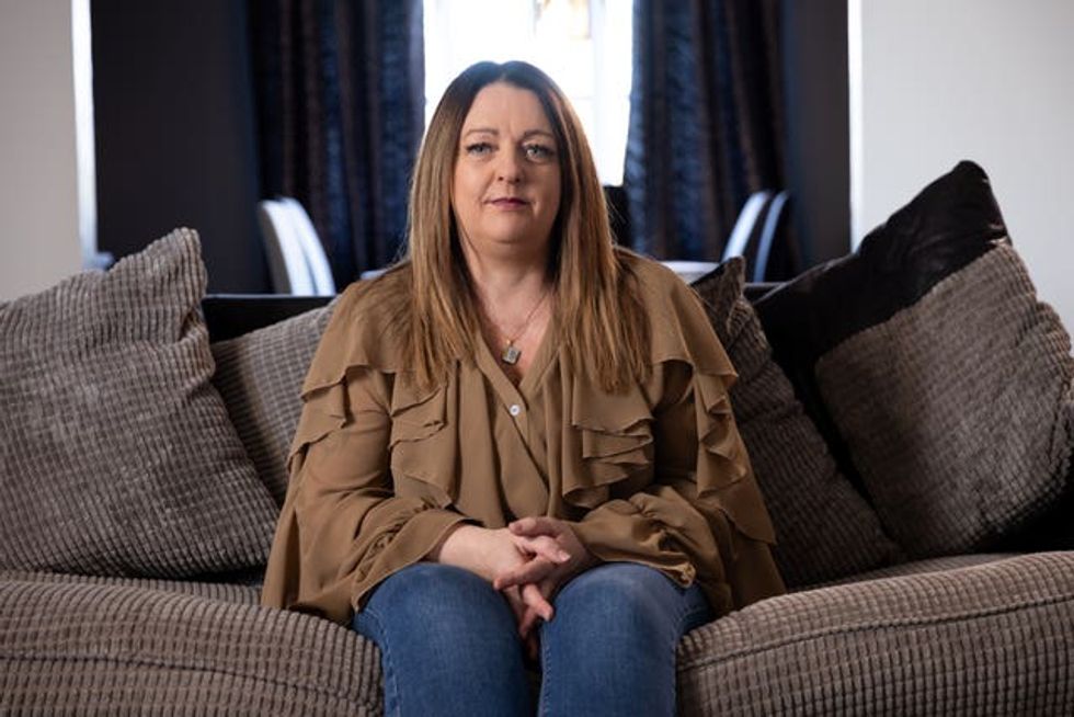 Mandy Galloway sitting on a sofa