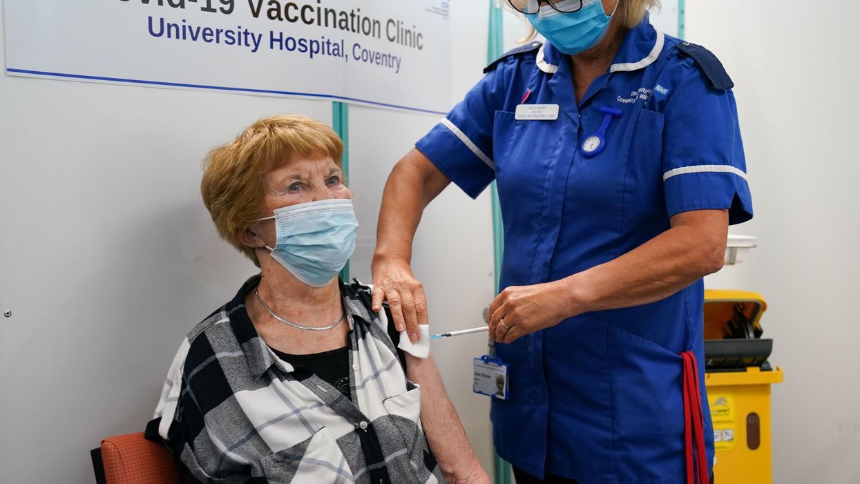 Margaret Keenan receives her booster shot from Julie Baines (Jacob King/PA)