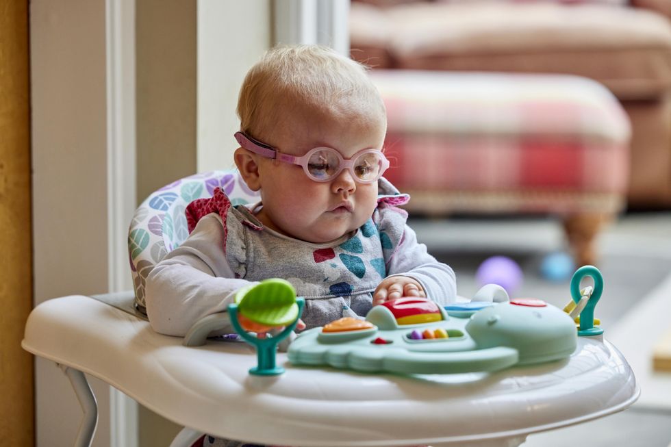 Girl born with no eyes ‘has changed our lives for the better’, say parents