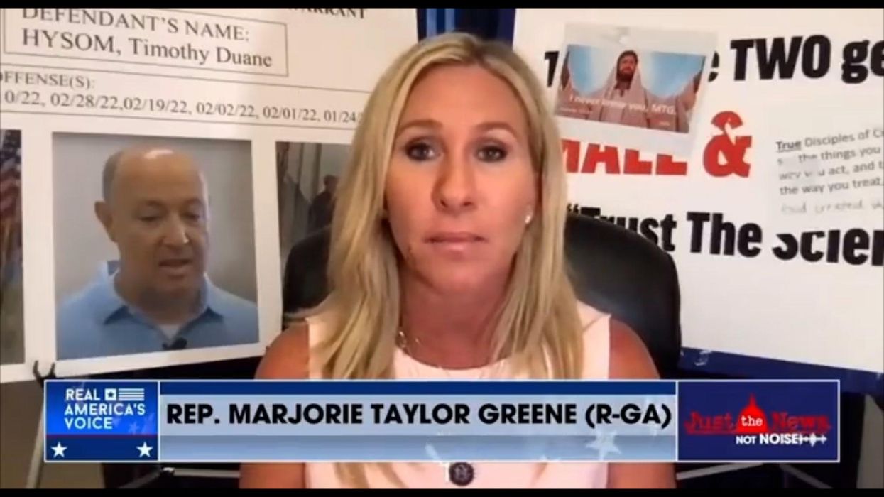 Marjorie Taylor Greene hits out at staffer covering up her 'two genders' sign