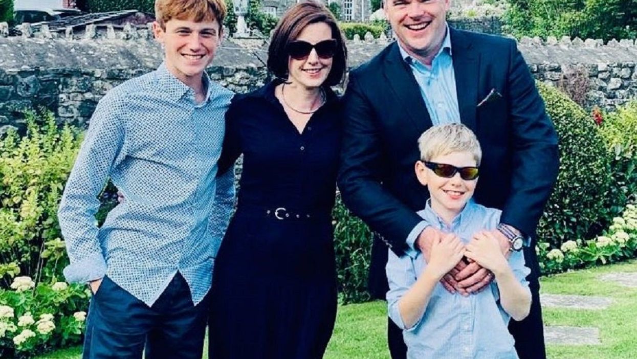 <p>Mathew O’Toole with his wife Georgina and their two children</p>