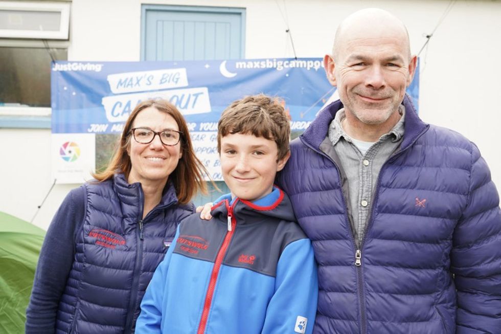 Max Woosey with his parents