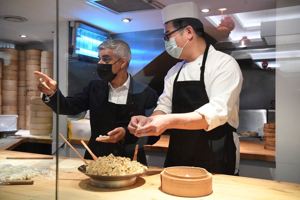 Mayor of London Sadiq Khan making dumplings with head chef Lin Bing during a visit to Dumplings\u2019 Legend in China Town, London (Kirsty O'Connor/PA)