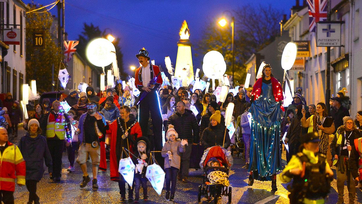 Mayor Stephen Martin led the community lantern parade through the village of Royal Hillsborough (Pacemaker Press/PA)