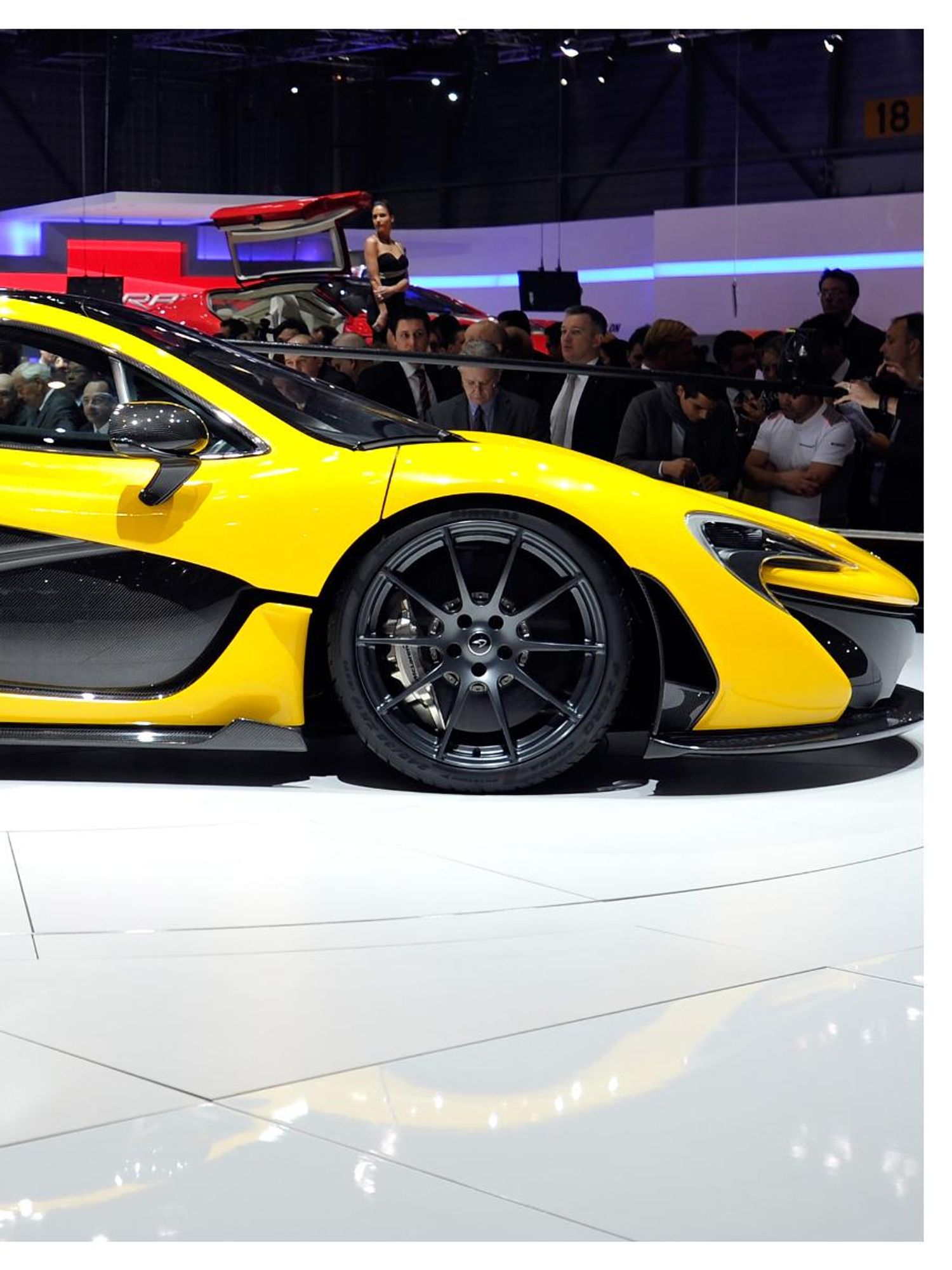 Moment a million-dollar McLaren sports car was washed away by Florida floodwater