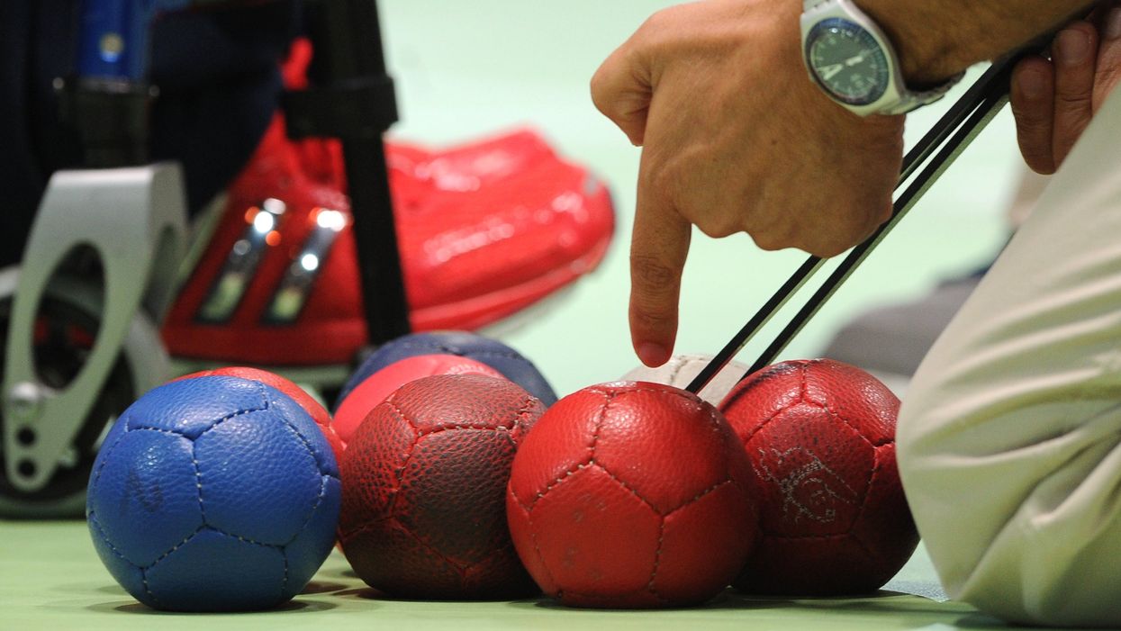 Measurements are made during the Boccia mixed pairs BC3 bronze medal match at the ExCel Arena, London