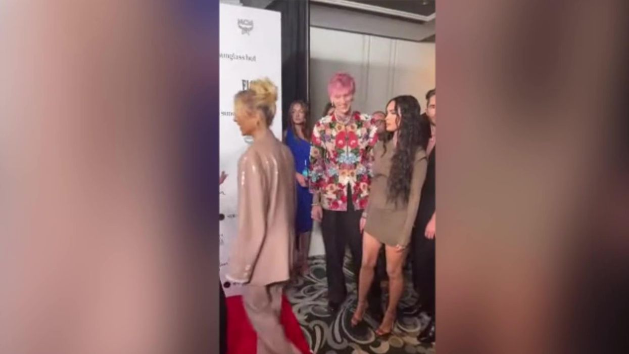 Megan Fox awkwardly dodges Machine Gun Kelly PDA in tense red carpet clip