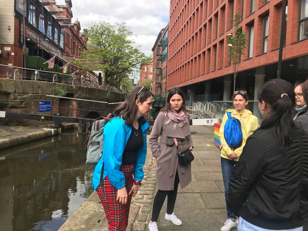 Megan Marie Griffith and Maria Romanenko leading a tour of Manchester