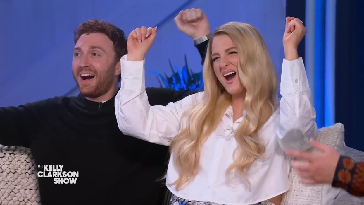 Meghan Trainor does wild live TV gender reveal with assistance from 'voice of God'