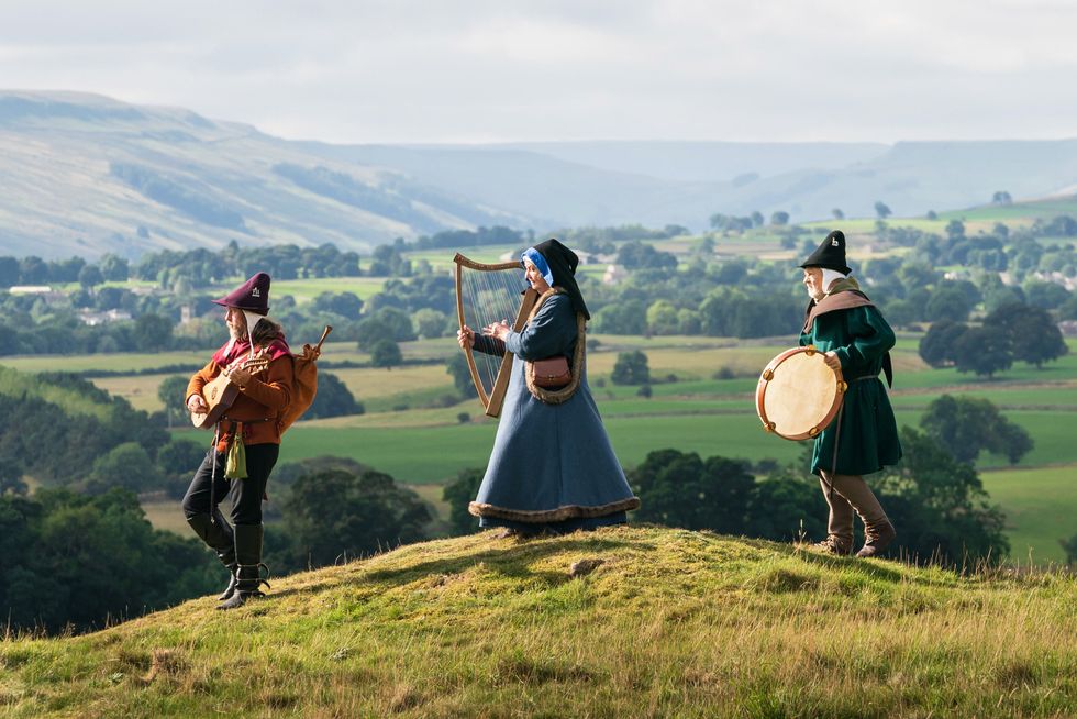 Members of medieval group Maranella in the grounds of Castle Bolton (Danny Lawson/PA)